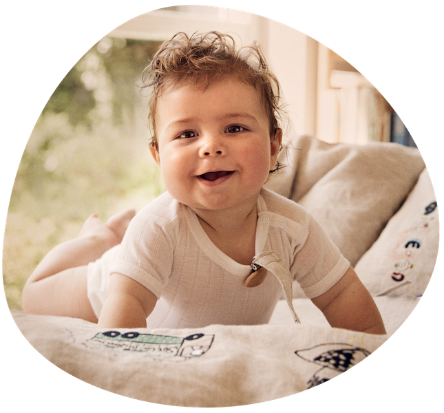 Baby on personalized baby bedding